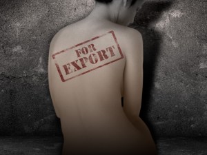 This image is from an article about human trafficking published on GMA News Online. It implies the individual hardship of trafficking, and connects this to the broader economic context that encourages trafficking to profit from international sources 